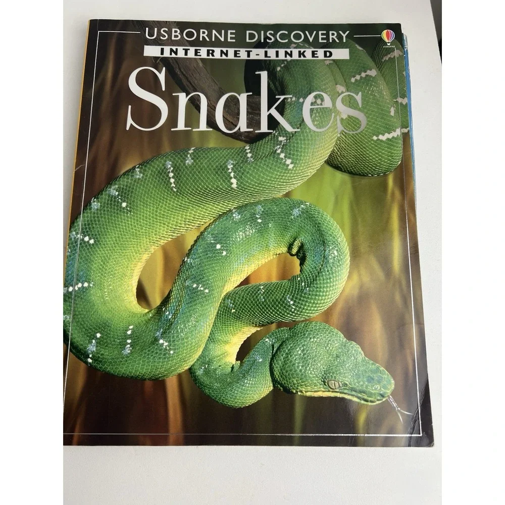 Entire set of Discover Books. Big Cats, Shark, Snakes, & Dinosaurs 4 In Total